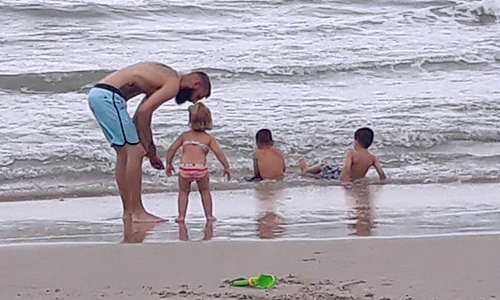 Family Playing in the Ocean