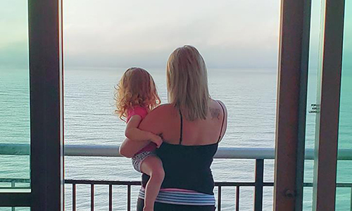 Mom and Daughter on Balcony