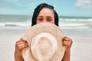 Girl on Beach with Hat