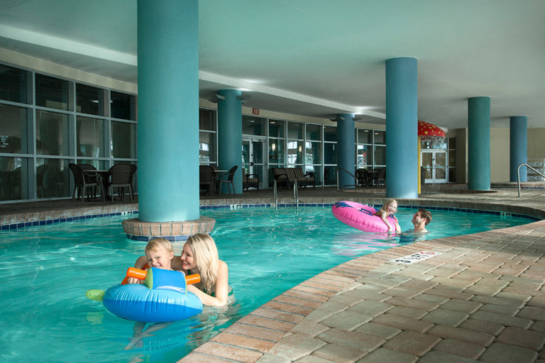 Family enjoying the indoor pool