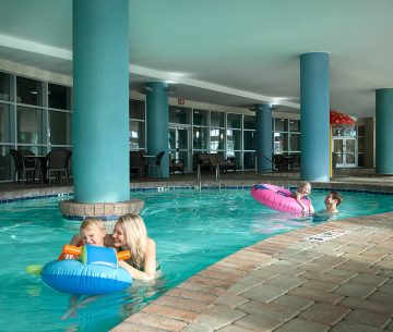 Family enjoying the indoor pool