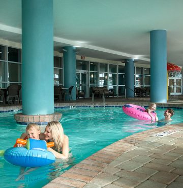 Family enjoying the indoor pool