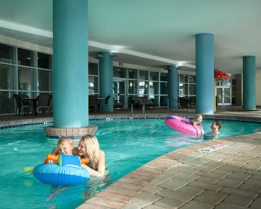 Family enjoying the indoor pool