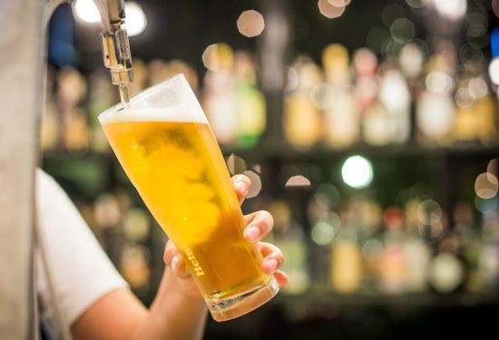 Beer being poured from tap