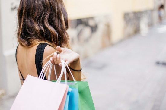Woman with shopping bags Woman with shopping bags